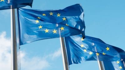 Row of blue European Union flags in Brussels.