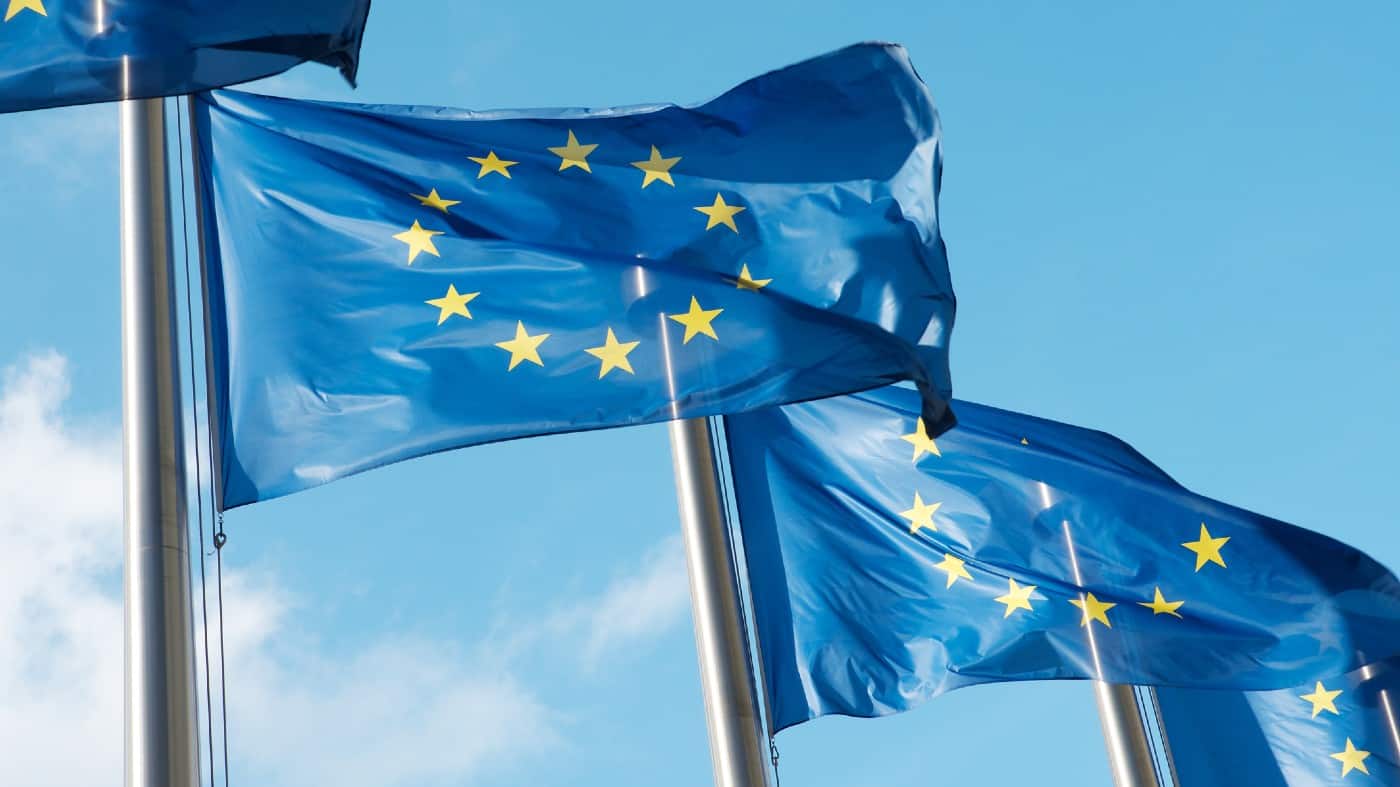 Row of blue European Union flags in Brussels.