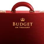 Red briefcase with the words Budget HM Treasury embossed in gold